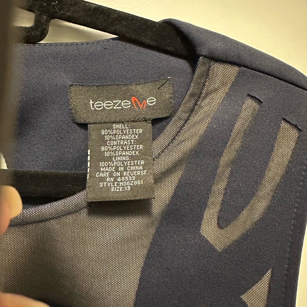 New without tags. Navy in color.  Never worn.